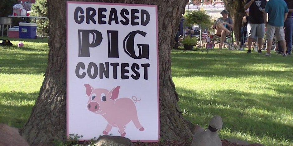 sign for greased pig contest